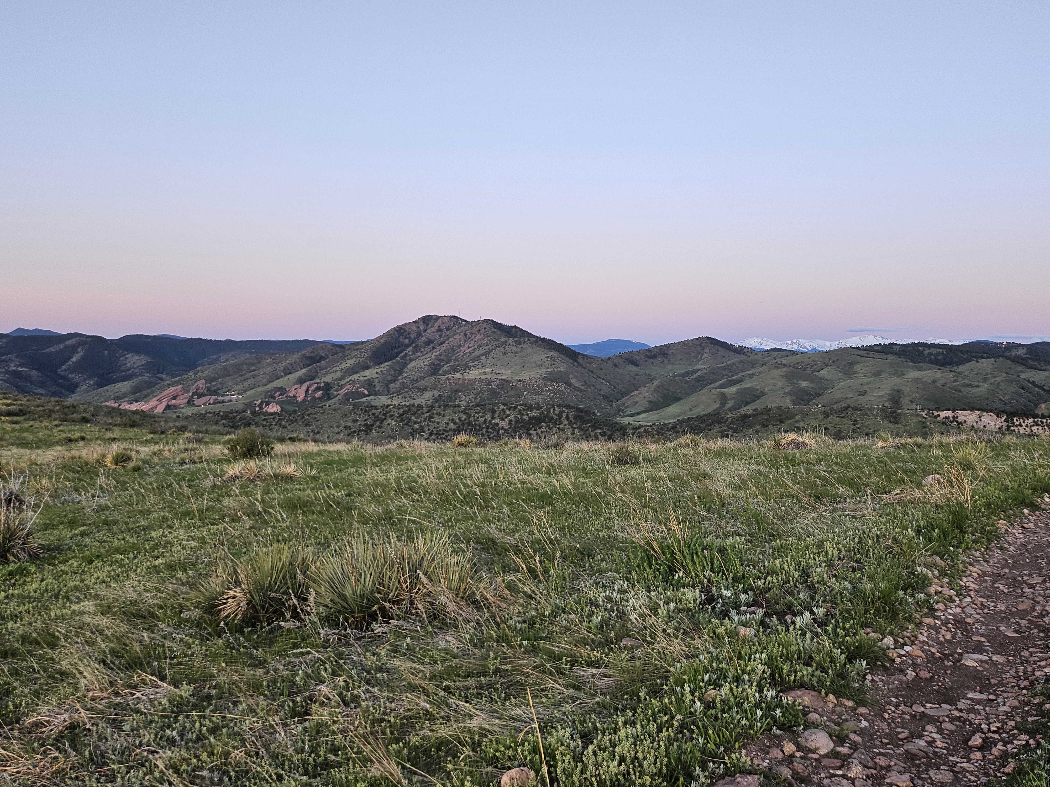 Sunrise over Colorado hills, symbolizing a fresh start and pro-living.